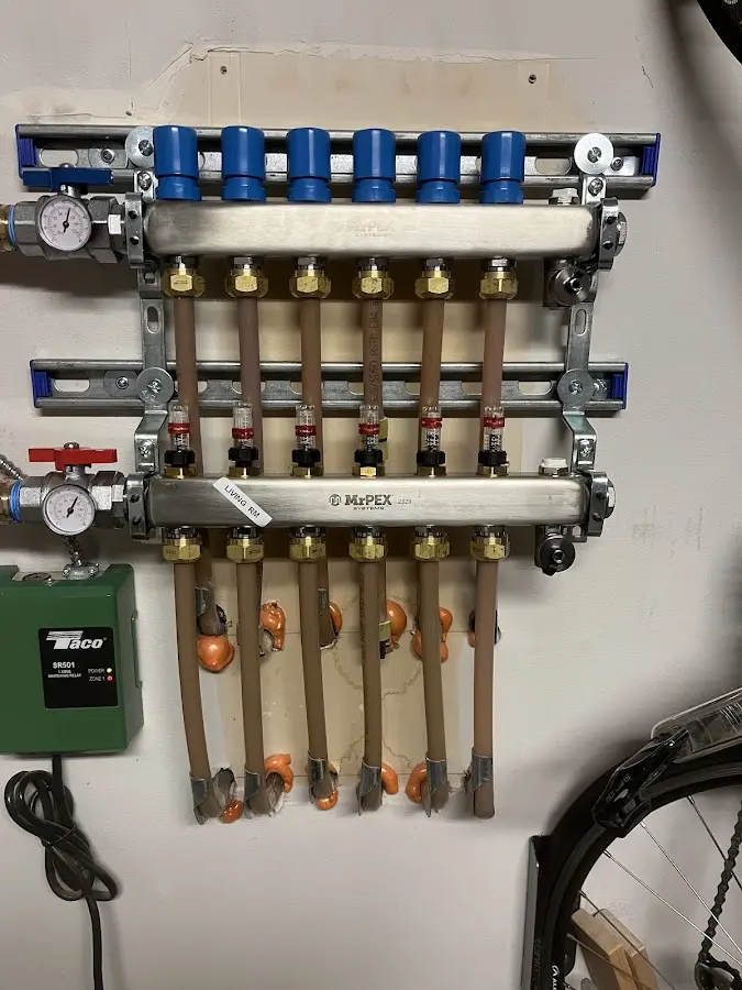 Plumber performing Leak Detection at a residential property in Paw Paw